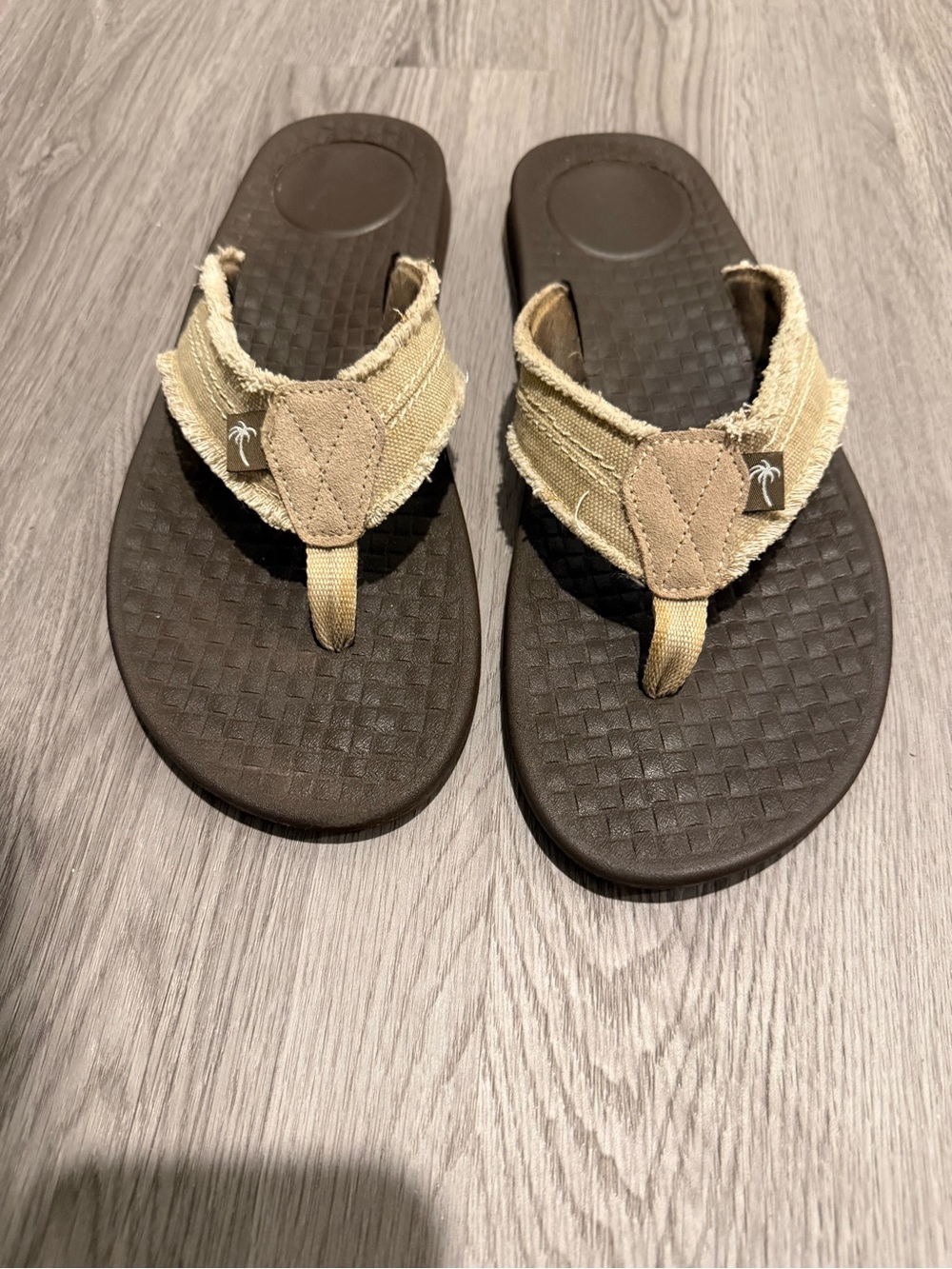Margaritaville Men's Tan Canvas Flip-Flops with Dark Brown Footbed